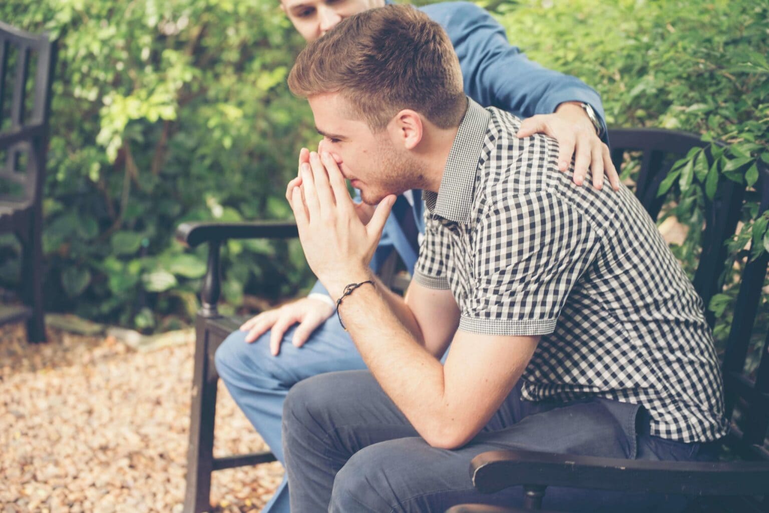 man helping his friend with depression