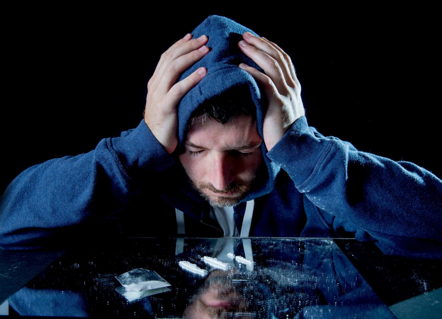 depressed man experiencing the negative effects of cocaine